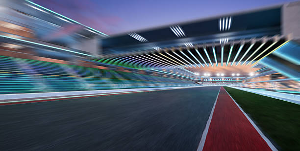 istock 3d rendering racing track at dusk with motion blur effect, showing speed and competition 2223307627