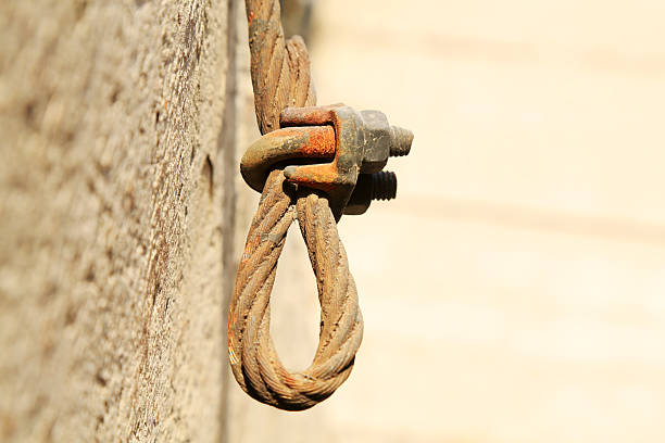 steel wire rope full of greasy dirt and connection fasteners