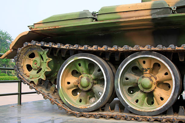 End of a conflict symbolized by a war tank and a white flower