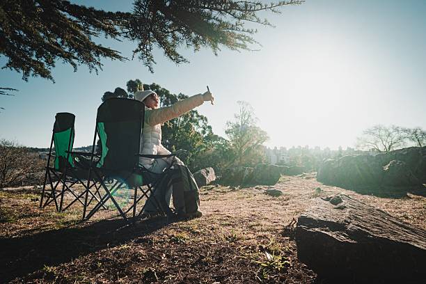 istock Person capturing nature in a park 2223324296