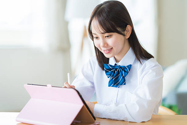 istock High school girl studying at home 2223326286