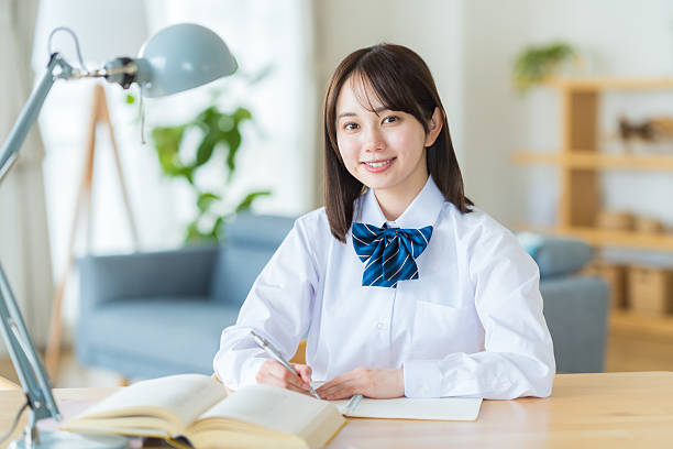 istock High school girl studying at home 2223326344