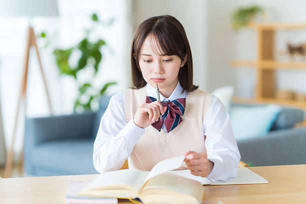 High school girl worried while studying at home