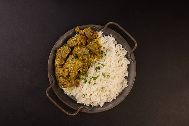 Lamb Korma is Lamb or Mutton with a Sauce Made From Yoghurt  and Almonds, Served with Rice.