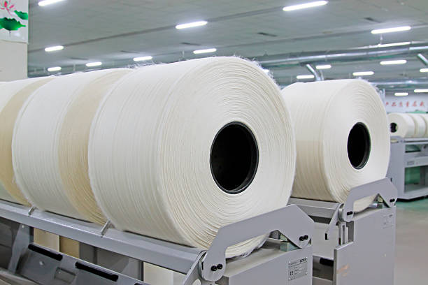istock Cotton yarn and mechanical equipment in the workshop 2223328186