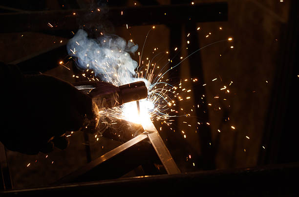 istock A man is welding metal with sparks flying 2223328511