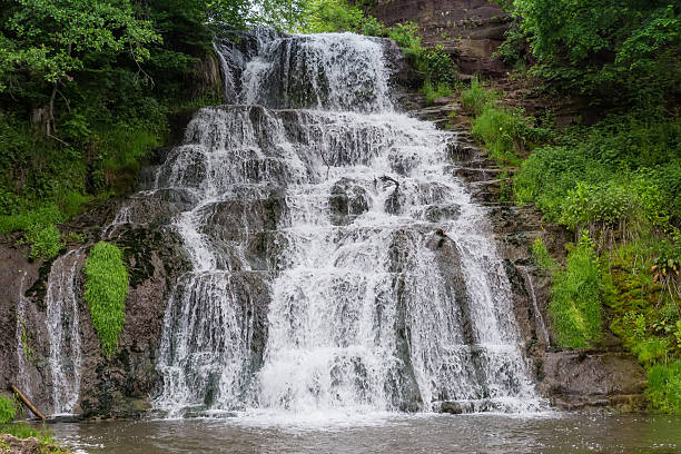 istock Upper cascade of Dzhurynskyi waterfall in spring overcast day, Ukraine 2223330053
