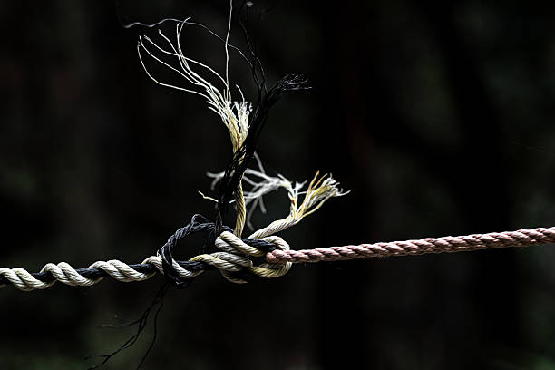 Two ropes that seem about to break