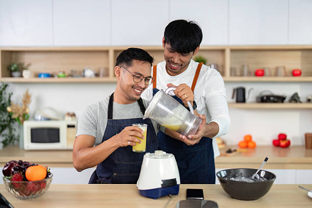 Healthy Cooking: Friends Making Smoothies in the Kitchen