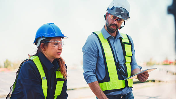 istock Team Engineer technician people working in powerhouse MDB Main Distribution Board in solar farm. 2223346486