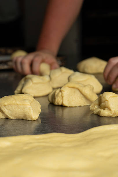 istock Baker making a preparation with dough for bread and cakes 2223349990