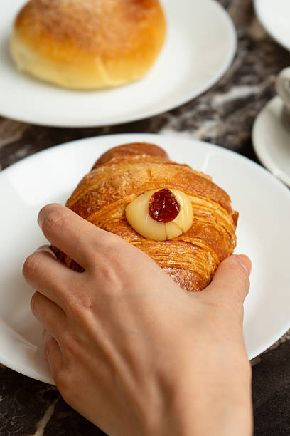 istock Breakfast with brioches and sfogliatella at a bar table 2223354544