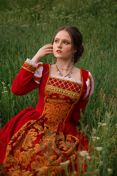 istock Medieval princess in the field 2223356889