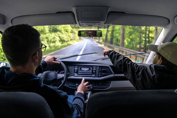istock Passenger looking ahead. Driver in rain. Car journey. 2223357426