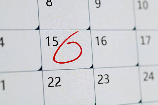 Data 18 19 e 20 su planner, close up of calendar page. Selective focus