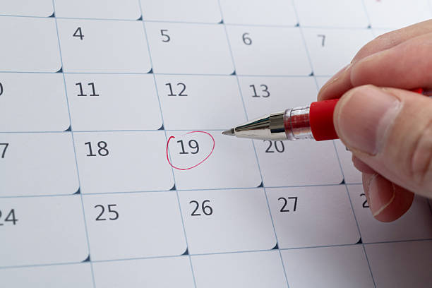 istock Red mark on the calendar at number 19 2223358799