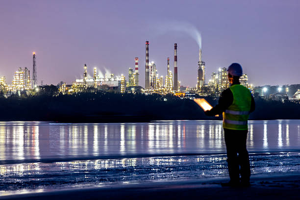 istock A chemical plant engineer inspects equipment at night 2223359079