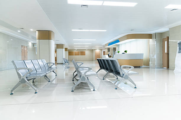 istock Hospital waiting room with many empty chairs 2223359095