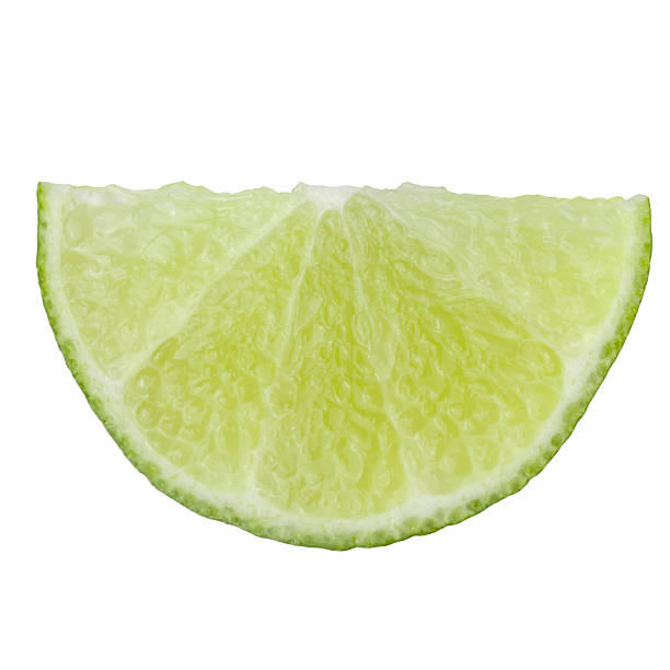 Organic fresh lime with leaves isolated on white. Lime slice Isolated on white background. Lime clipping path