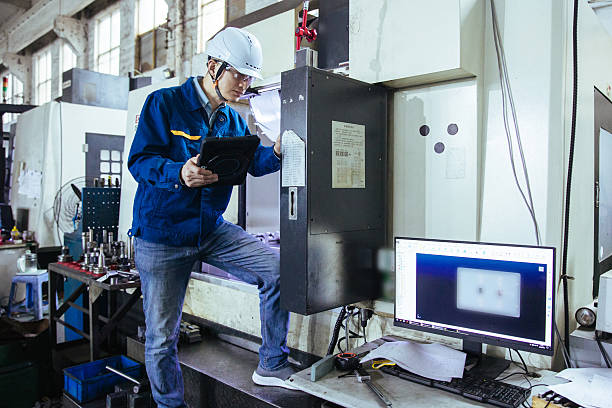 Engineer use milling machine,Examining the metal in factory