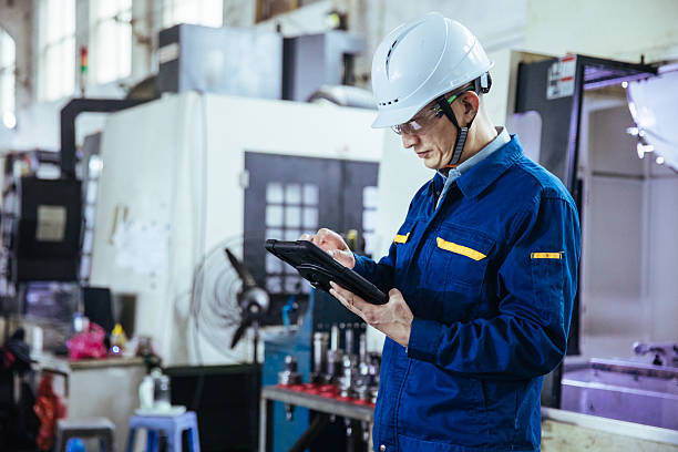istock Engineer use milling machine,Examining the metal in factory 2223363118
