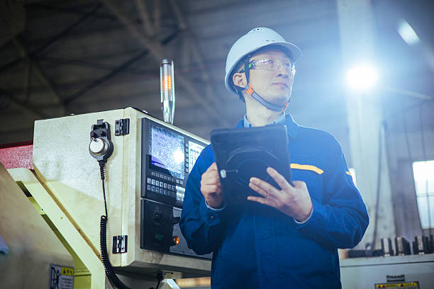 istock Asian male engineer working with digital tablet in factory 2223363343