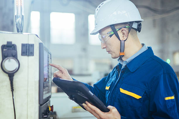 istock Asian male engineer working with digital tablet in factory 2223363346
