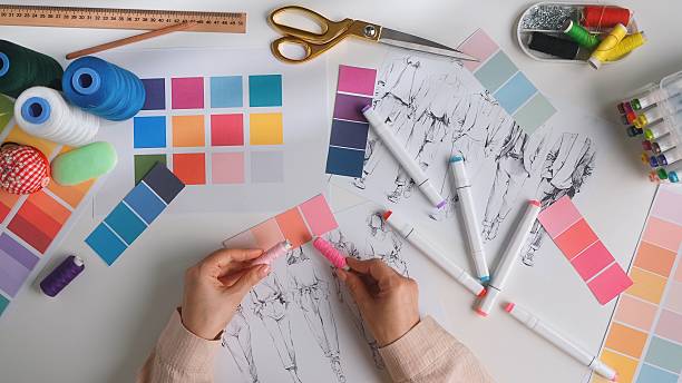 istock Creative Fashion Design Process with Color Samples and Sketches 2223363385