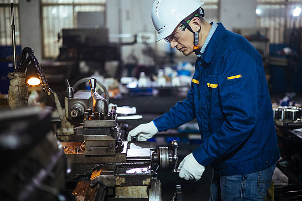 istock Asian male engineer working on lathe 2223363388