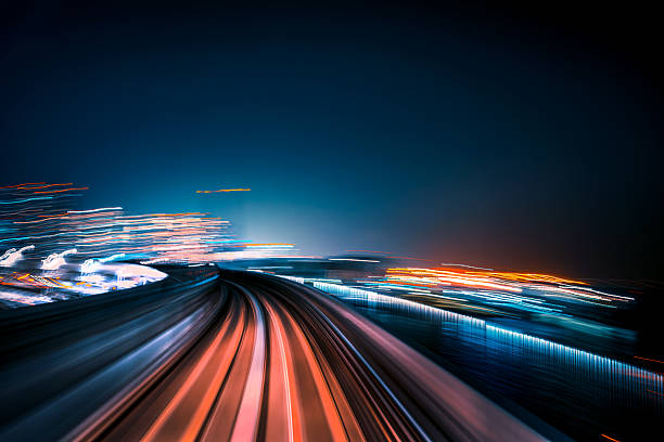 istock High Speed Motion at Night Through Futuristic Cityscape 2223366269