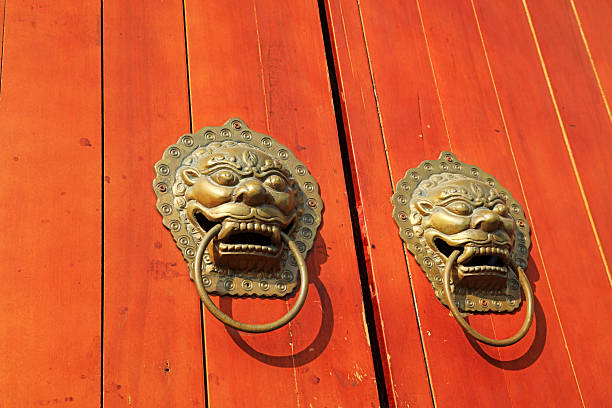 traditional Chinese knocker on the wooden door