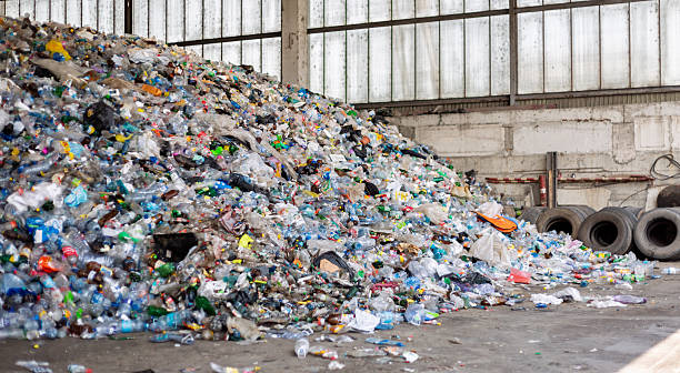 istock Plastic waste polluting the environment in a recycling center 2223370496