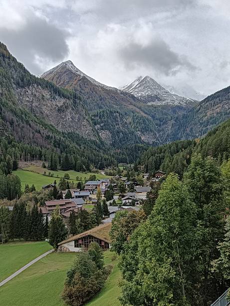 istock Alpine village with mountain backdrop in Austria 2223386207