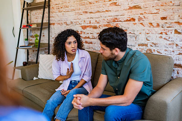 istock Young couple arguing during couple therapy session at clinic 2223386231