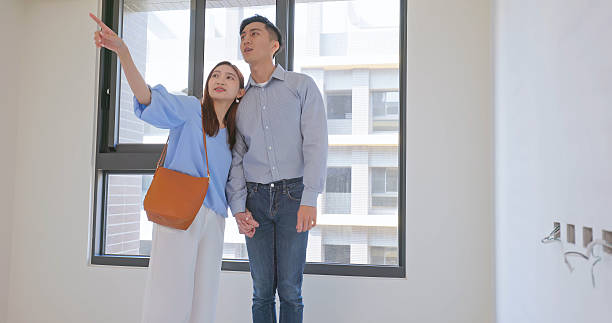 istock Asian Young Couple Home Tour 2223390130