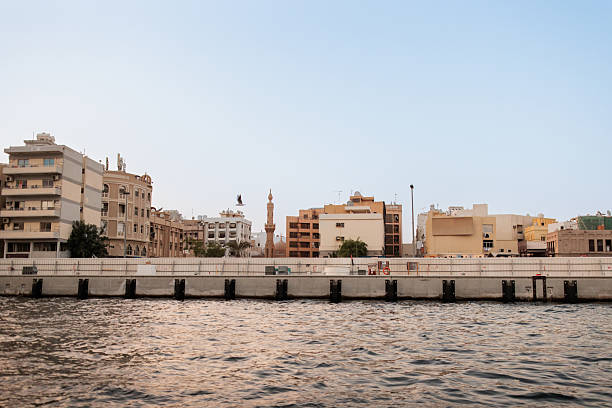 Bur Dubai skyline along Dubai Creek, Al Shindagha area - old style architecture of the Persian Gulf.
