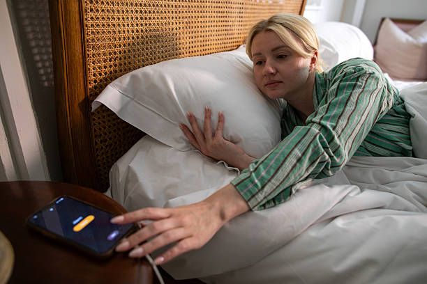 istock Turning Morning Alarm Off 2223395152