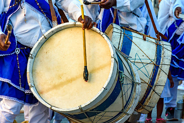 istock Musicians with their rustic wooden drums 2223395654