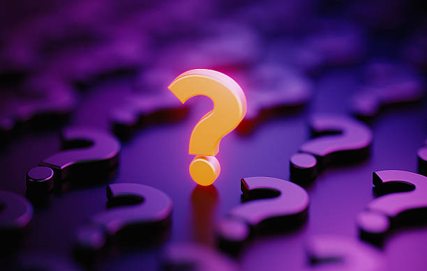 istock Yellow Question Mark Surrounded By Purple Question Marks On Purple Background - Feedback And Questionnaire Concept 2223401850