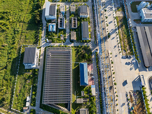 istock Aerial View of Solar Panels and Greenery 2223402511