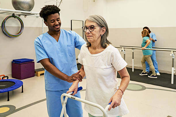 istock Physiotherapists helping patients with balance and stability 2223406092