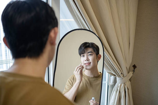 istock Reflections of Confidence: A Man's Quiet Moment by the Window 2223410870