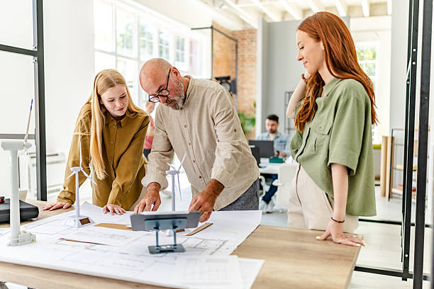 istock Collaborative planning session in a Scandinavian office with diverse professionals brainstorming innovative ideas 2223415146