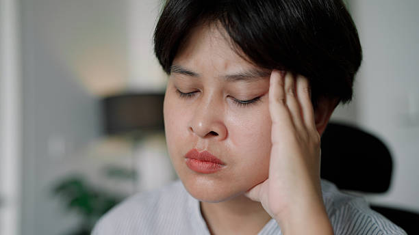 istock Asian woman calculate expenses at home 2223416155