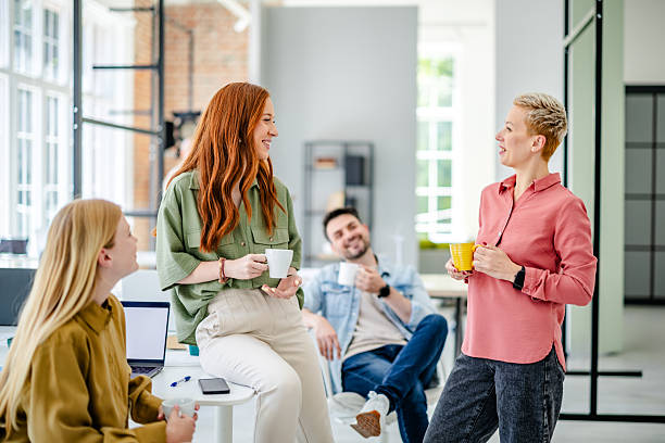 istock Collaborative discussion among professionals in a Scandinavian-style office space during a productive business meeting 2223421861