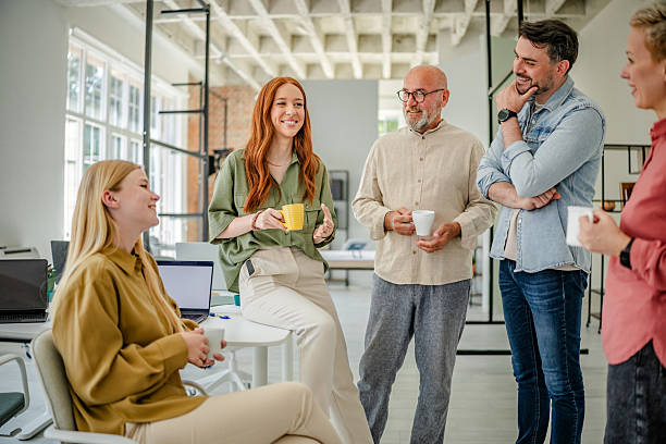 istock Collaborative meeting in a Scandinavian office space with professionals sharing ideas and inspiration 2223422188