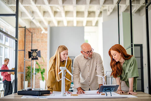 istock Collaborative professionals in a Scandinavian style office engaging in planning and idea development 2223422614