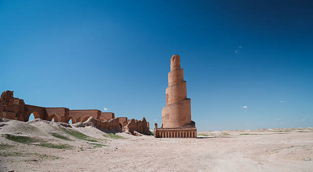 istock Exploring the ancient minaret and ruins in Abu Dulaf Iraq under a clear sky 2223422791