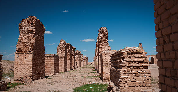 istock Historic ruins in Abu Dulaf Iraq showcasing ancient brick structures under blue sky 2223423064