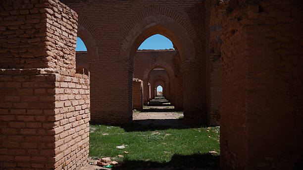 istock Exploring ancient brick arches and ruins in Abu Dulaf, Iraq under blue sky 2223423071